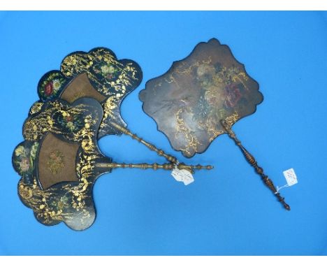 A pair of early 19thC papier-mâché Handscreens, the black lacquer scallop-shaped panels hand painted with floral sprays and d