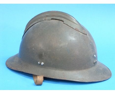 A W.W.2 British Paratroopers steel Helmet, together with a British Army 'Turtle' helmet, a civilian services Merrythought sty