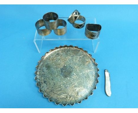 A collection of six silver Napkin Rings, approx total weight 5.4ozt, together with a Victorian silver and mother of pearl han