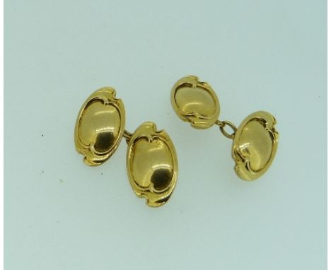 A pair of stylish Art Nouveau style 18ct gold Cufflinks, shaped oval backs and fronts with chain between, approx total weight