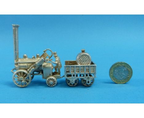 An articulated silver 'Stephenson's Rocket' miniature model, London import marks for 1979 - the 150th Anniversary year of bui