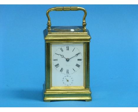 A French gilt-brass 8-day Carriage Clock, made for Tiffany & Co. New York, of five-glass form, the white enamelled dial with 