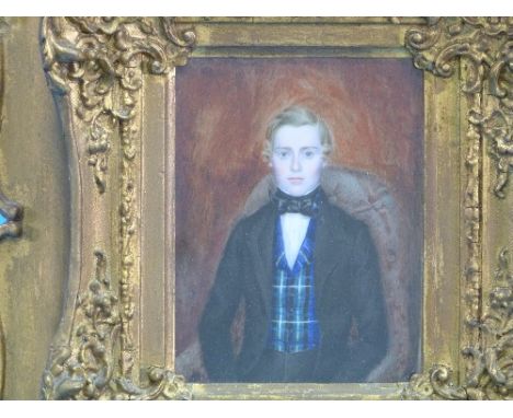 19th century School, Portrait miniature of a young man in black jacket and check waistcoat, 4½in x 3½in (11.5cm x 9cm) and a 