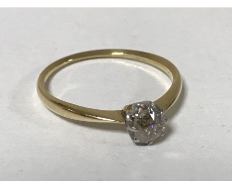 An 18ct gold old cut solitaire diamond ring 