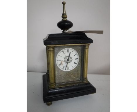 A German brass and marble mantel clock (missing a foot)