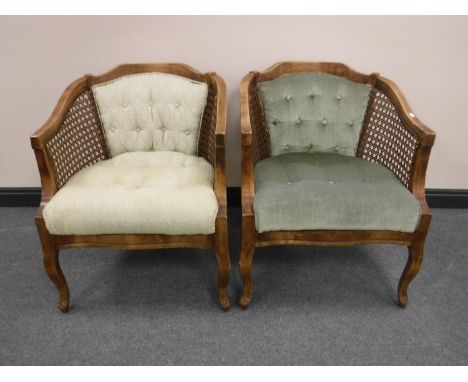 Two button upholstered bergere armchairs 