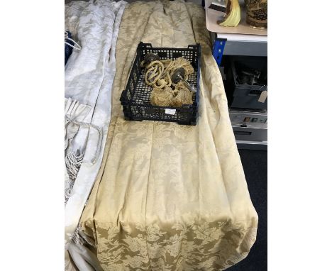 A pair of gold floral fully lined curtains, drop 280 cm, with tie backs 