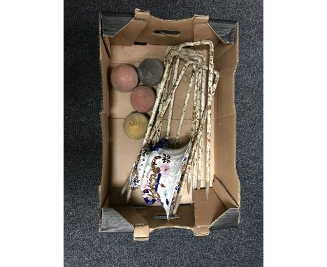 A box of six metal croquet hoops and four balls, an antique English china planter 