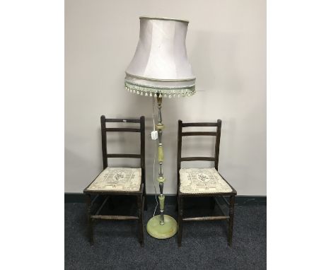 A pair of Edwardian oak bedroom chairs together with a standard lamp and shade 