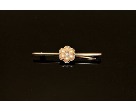 A diamond and pearl bar brooch