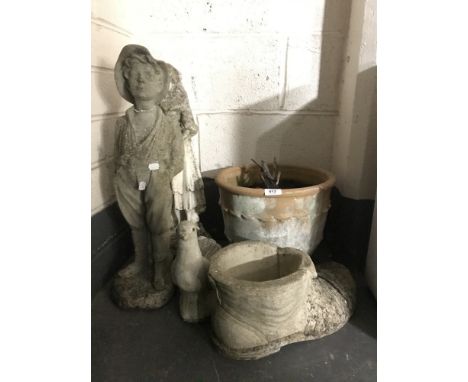 Two garden figures - boy and girl, a garden boot planter, figure of a stork and a terracotta plant pot  