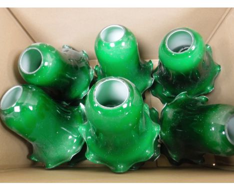 A box of thirteen green glass light shades 