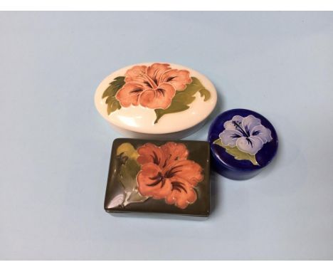 Three Moorcroft trinket boxes