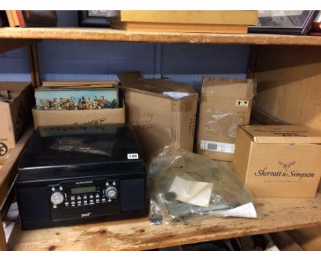 A quantity of boxed figures, box of records and a record player