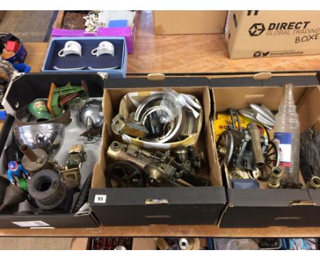 Three boxes to include live steam engine parts, head lamps, candlesticks etc.