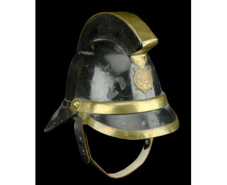 Glasgow Fire Brigade Late 19th, early 20th Century Helmet. A rare example, the skull of hardened stout leather with a blacken