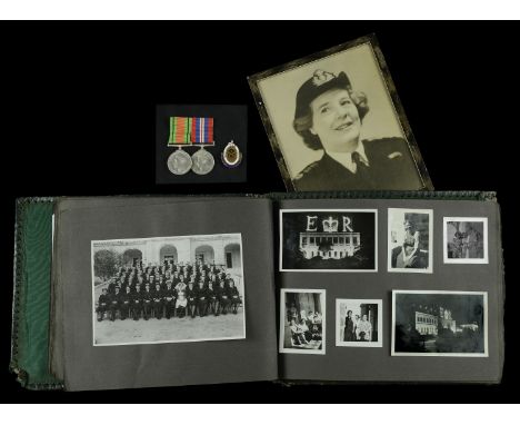 Pair: Senior Nursing Sister W. Woof, Queen Alexandra’s Royal Naval Nursing Service, together with an extensive photograph alb