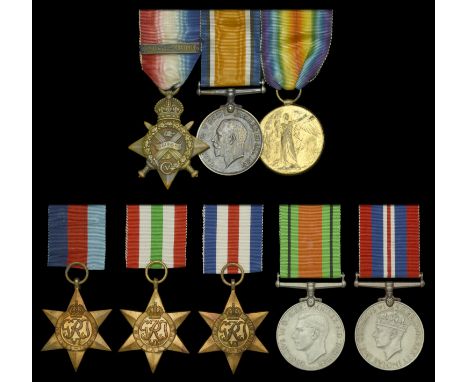 Family Group:  Three: Private J. Wood, 18th Hussars, who was taken Prisoner of War during the Great War 1914 Star, with clasp