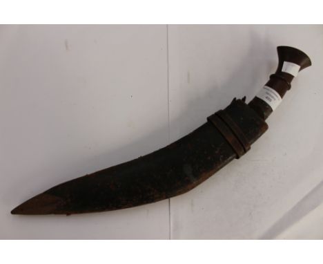 A Kukri in scabbard 