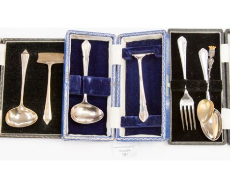 A Birmingham 1946 child's feeder spoon and pusher (boxed) and boxed EPNS set, a chrome plated child's spoon and fork and a co