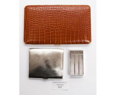 A Calibre simulated Alligator skin cigarette case and an engine turned silver cigarette case, with a calibre lighter  