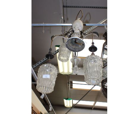 An Art Nouveau style chandelier light fitting, with stylised tulip motifs 