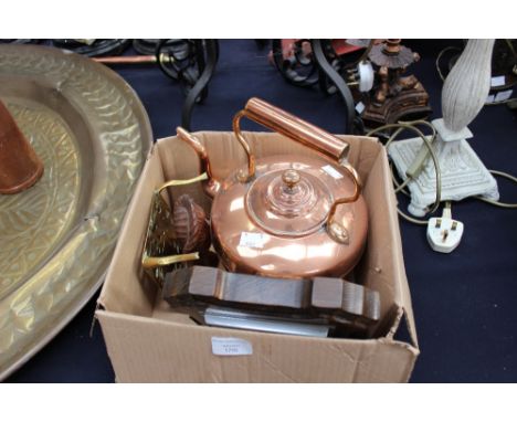A copper kettle, trivet, barometer and wood figure 