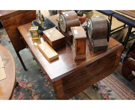 An early Victorian mahogany sofa table