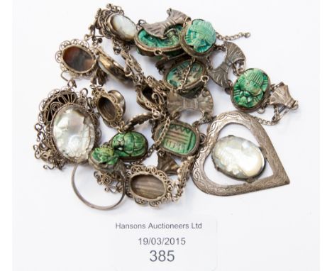 A Continental filigree silver and mother of pearl cameo brooch, pendant and bracelet and Egyptian silver and faux scarab brac