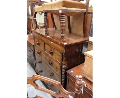 A mid Victorian mahogany chest of drawers, fitted with two short over three long graduated drawers, flanked to each side with