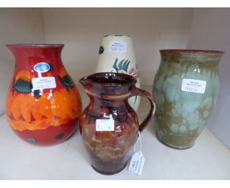 A collection of pottery including Poole volcano Venetian vase. Ewenny vase and jug and Trentham vase (4)