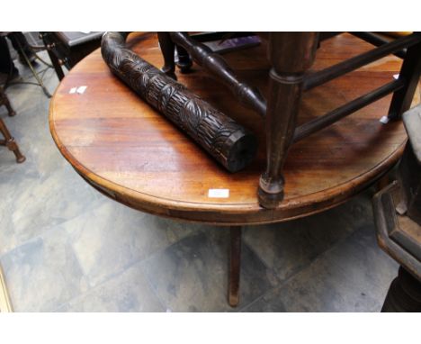 A 19th century mahogany breakfast table, raised on a tripod base