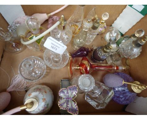 A collection of assorted scent and perfume bottles, including cut glass, Caithness glass, some gilded and some with applied r