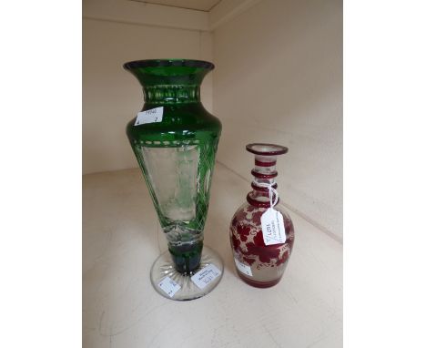 A Bohemian wine decanter  with ruby design and a Stonebridge green vase