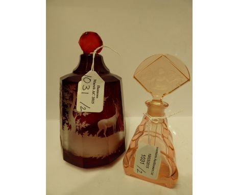 A Bohemian ruby-flashed glass flask and stopper and an Art Decon pink glass scent bottle