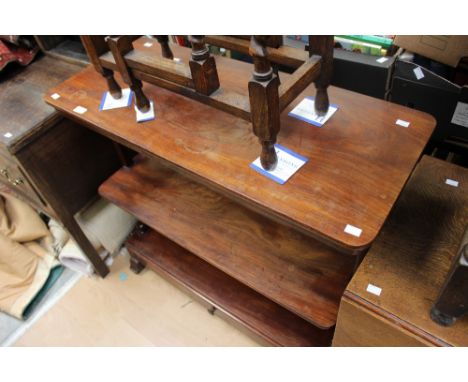 An early Victorian mahogany three tier buffet, fitted with a single drawer 