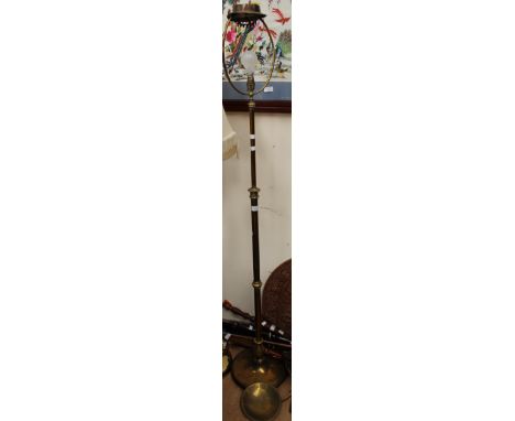 An Edwardian brass standard lamp, telescopic, with original oil lamp fitting, converted for electricity 