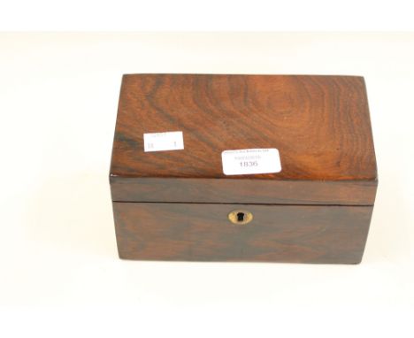 A rosewood tea caddy with key and lidded containers 