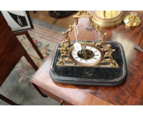 A French brass bracket clock, 19th Century (lacking glass dome) 