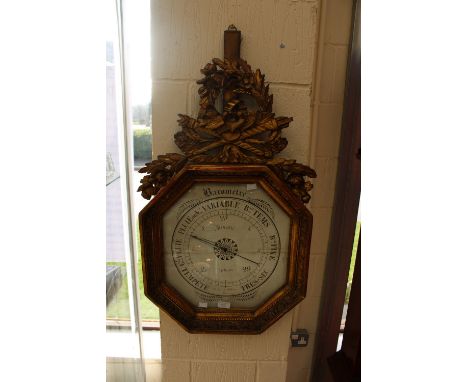 An early 19th Century French wall mounted barometer 