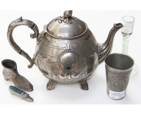 A pewter teapot, pin cushion and Edwardian boot ornament a 1933 German metal beaker, together with an 18th Century style cand