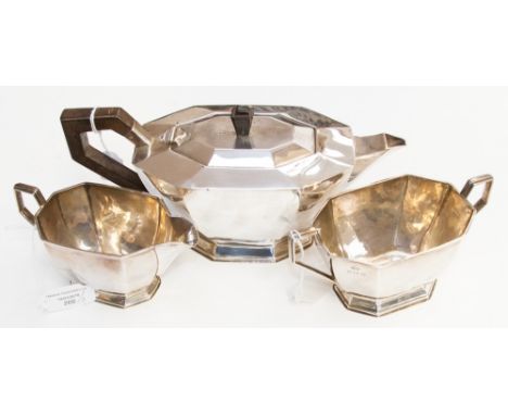 An Art Deco styled three piece silver tea service, Birmingham 1935 and 1936, approx 26.4 ozt all in  