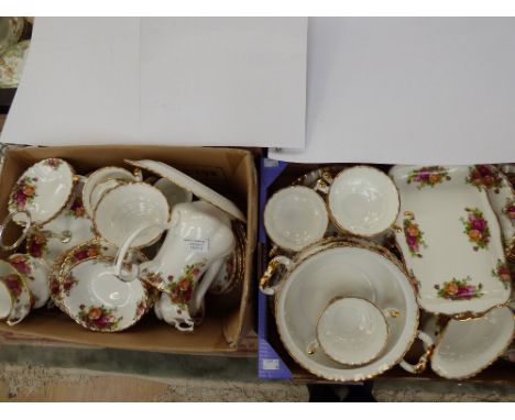 A Royal Albert Country Rose tea and dinner service 