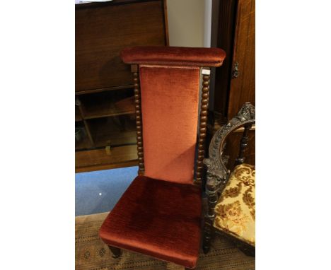 A Victorian mahogany Prie-Dieu chair, with bobbin turned supports, upholstered back and seat, raised on turned legs