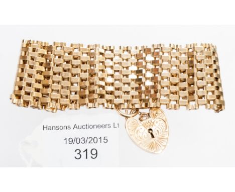 A 9 ct gold gate-link bracelet, 32 grams approx