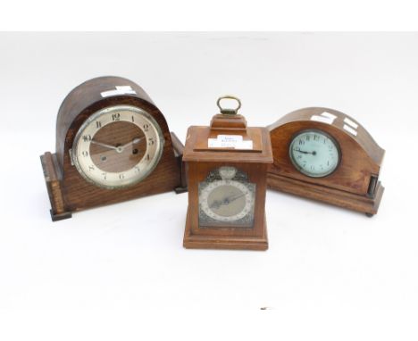Three twentieth century mantel clocks, including a JJ Russell of Rotherham and an RC Marsh & Co of Birmingham dome top mantel