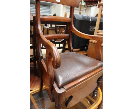 An early Victorian mahogany commode chair, converted, raised on turned legs