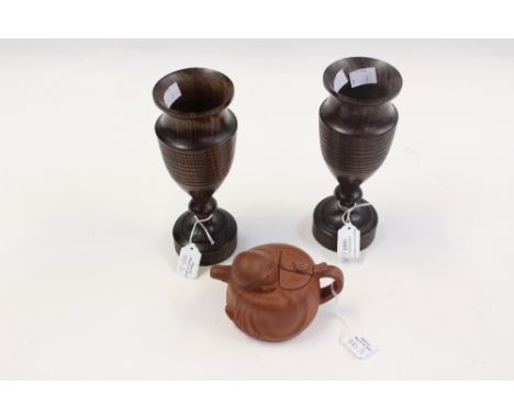 A pair of framed hardwood urns and a Chinese terracotta teapot with impressed mark (3) 