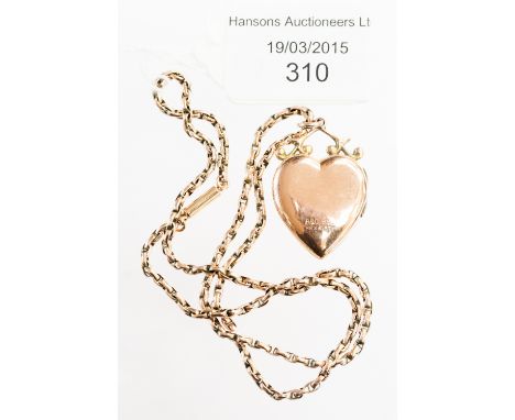 A 9ct gold heart shaped pendant with seed pearl and ruby inset on gold chain 