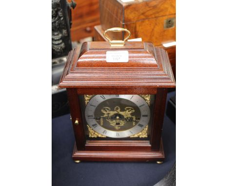A Committi of London mahogany cased bracket clock, mid 20th Century with carry handle to top, brass and silvered metal dial, 